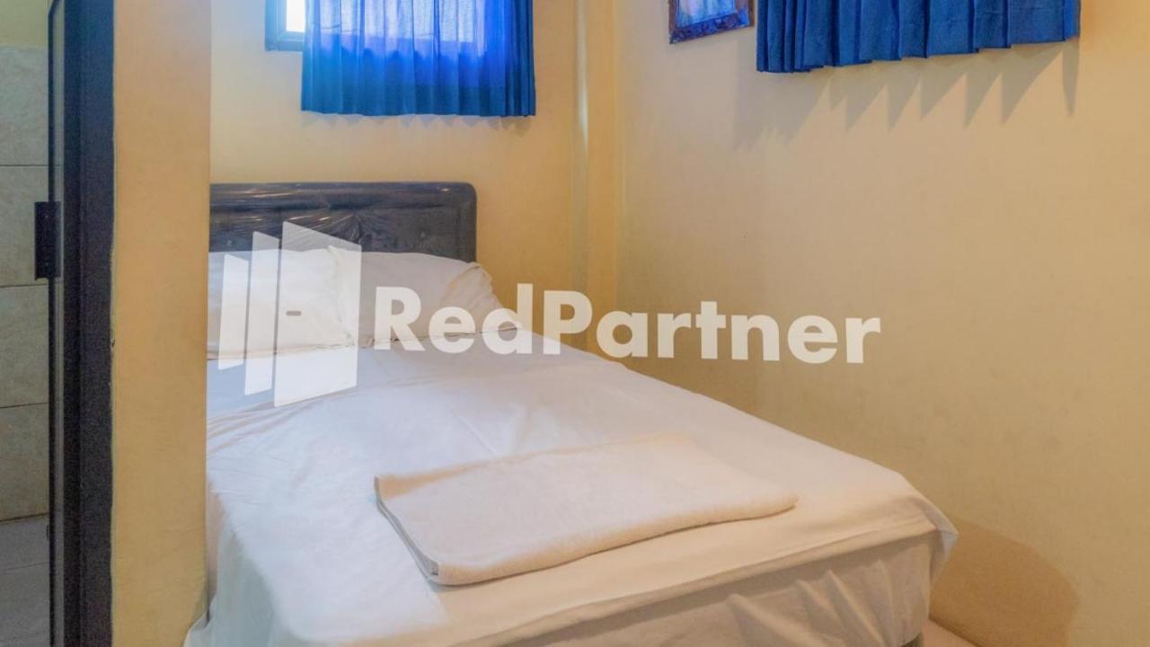 Vandhela Homestay Syariah Mitra Reddoorz Surabaya Buitenkant foto
