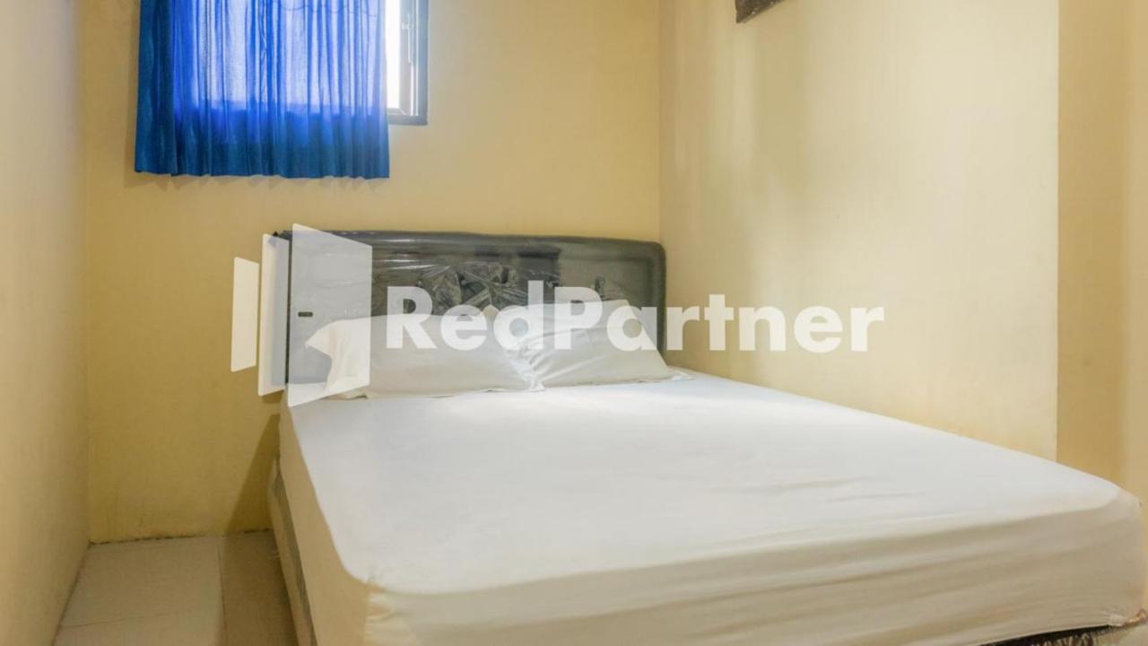 Vandhela Homestay Syariah Mitra Reddoorz Surabaya Buitenkant foto