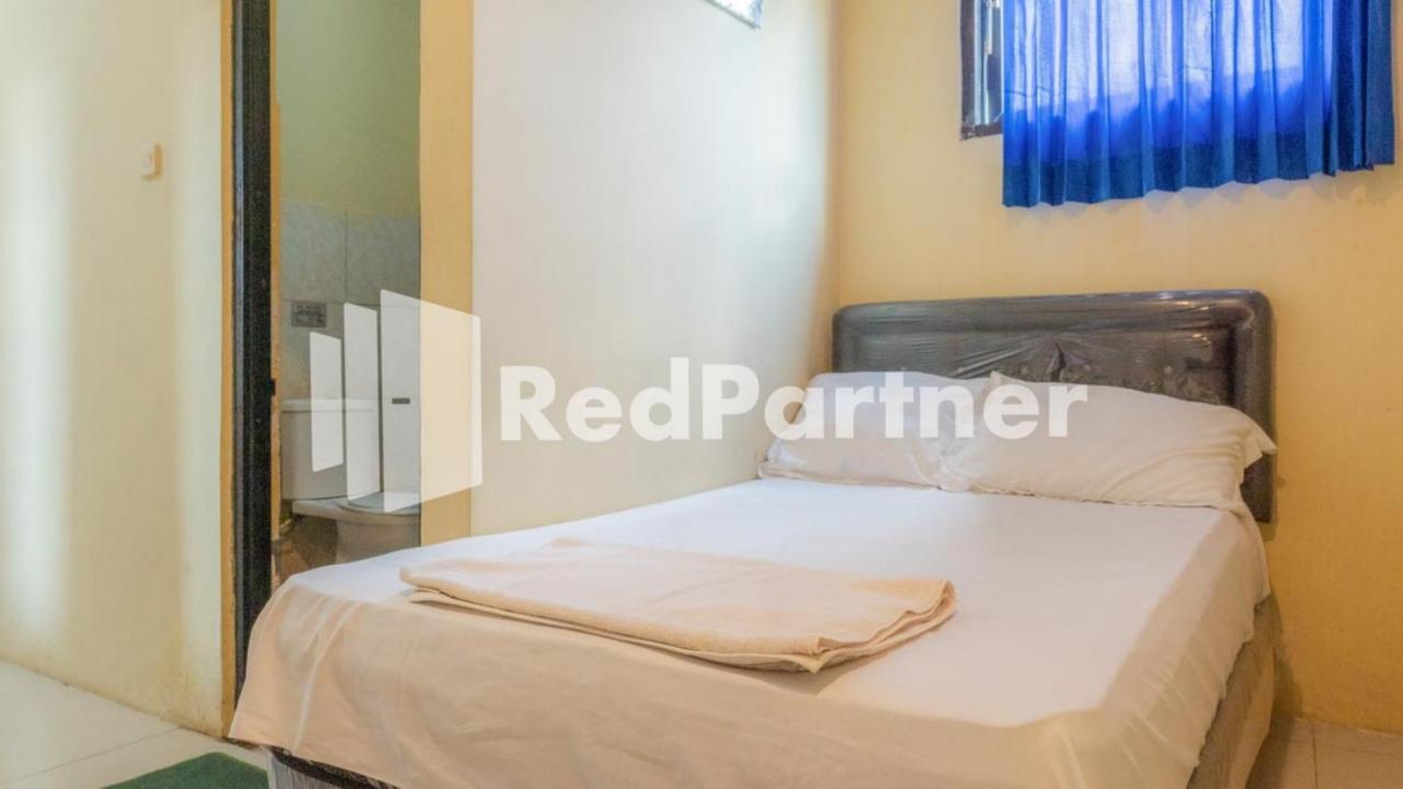 Vandhela Homestay Syariah Mitra Reddoorz Surabaya Buitenkant foto